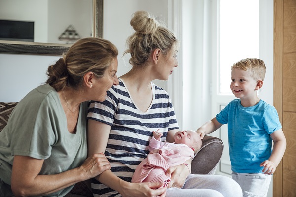 family with newborn baby