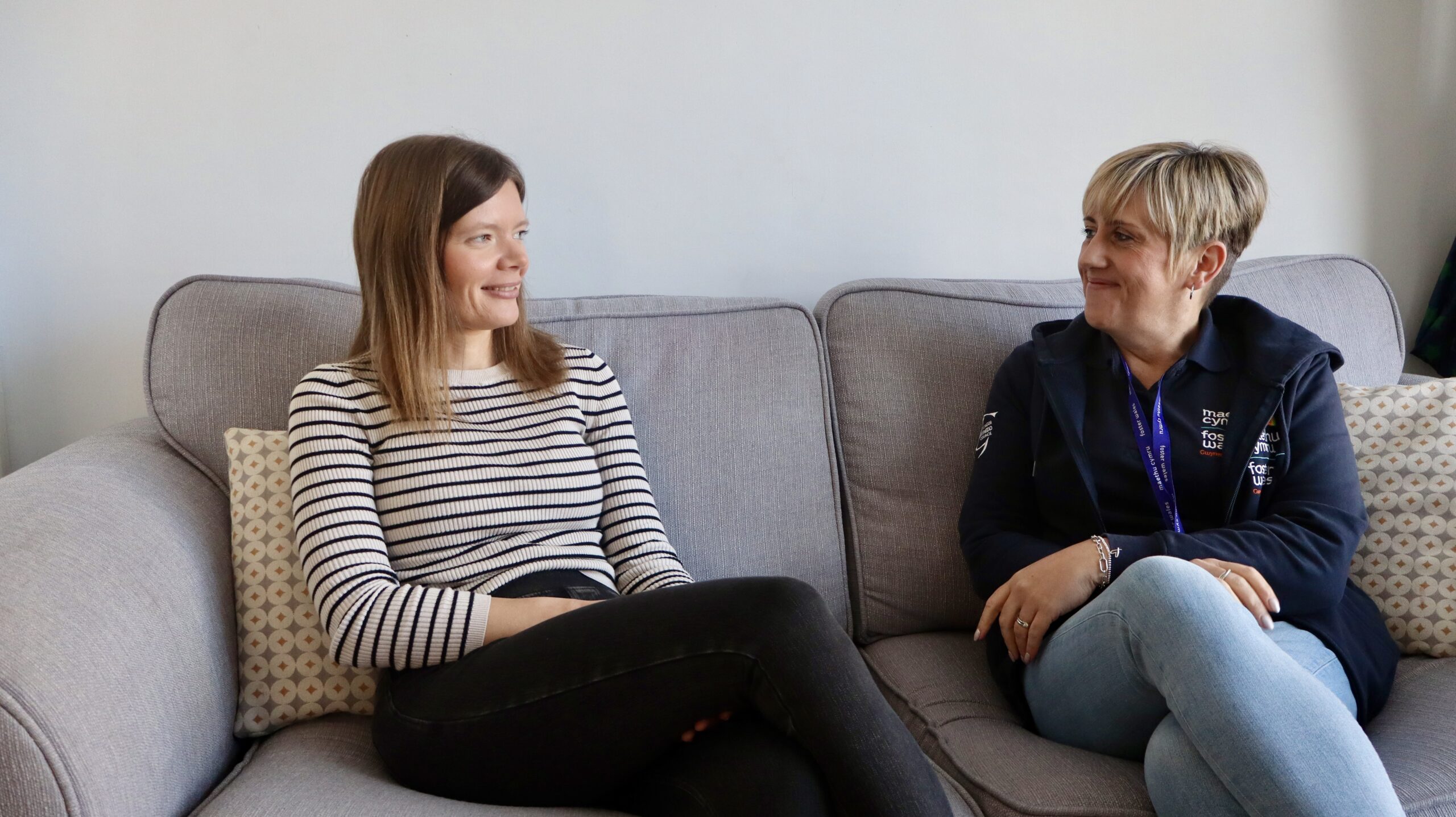 Foster Carer and Social worker chat on the sofa
