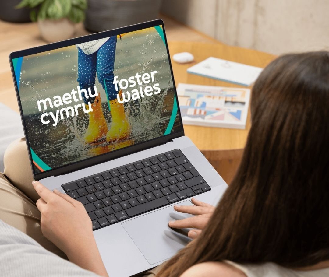 woman on couch with laptop